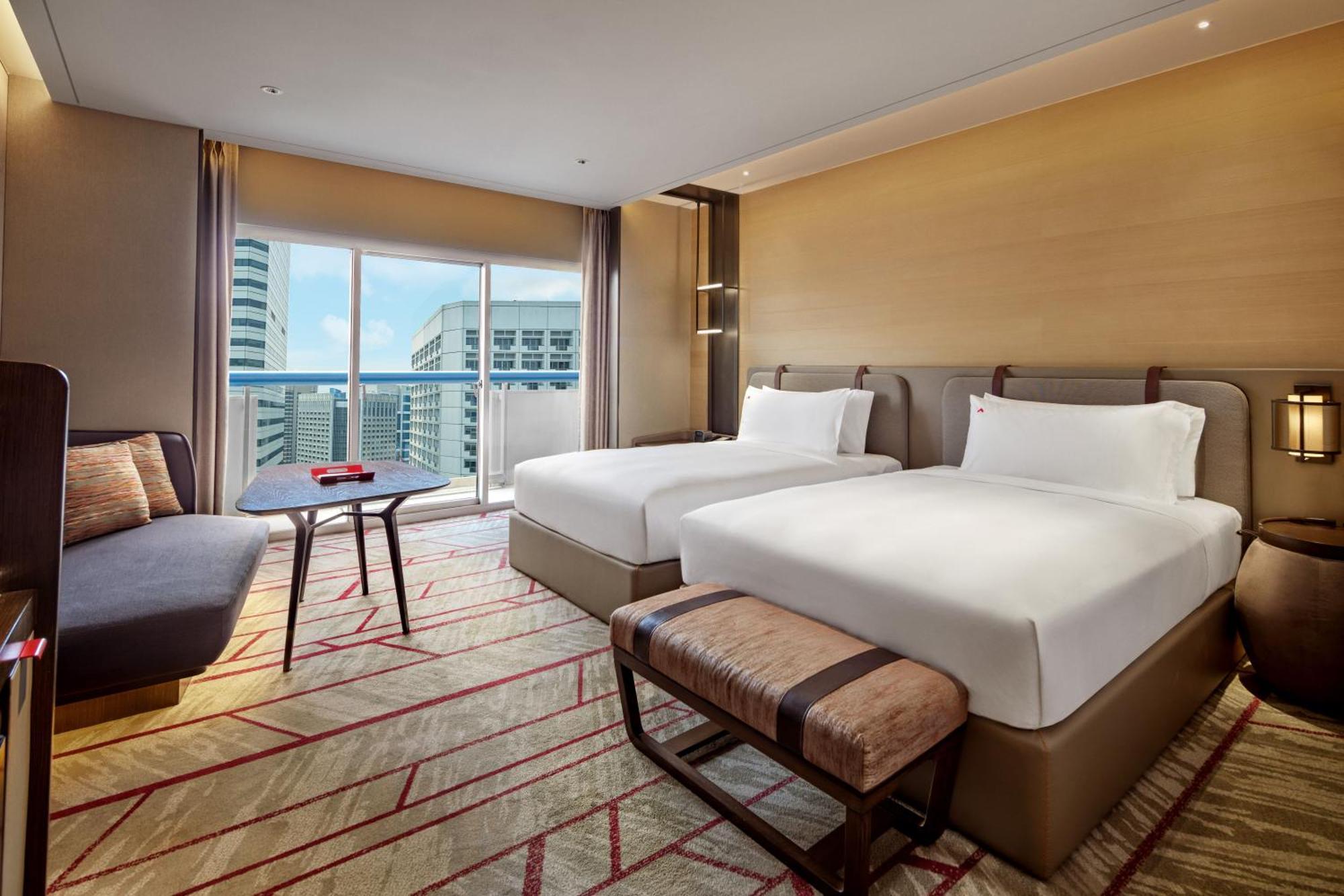 Swissotel The Stamford Singapura Exterior foto Deluxe Room